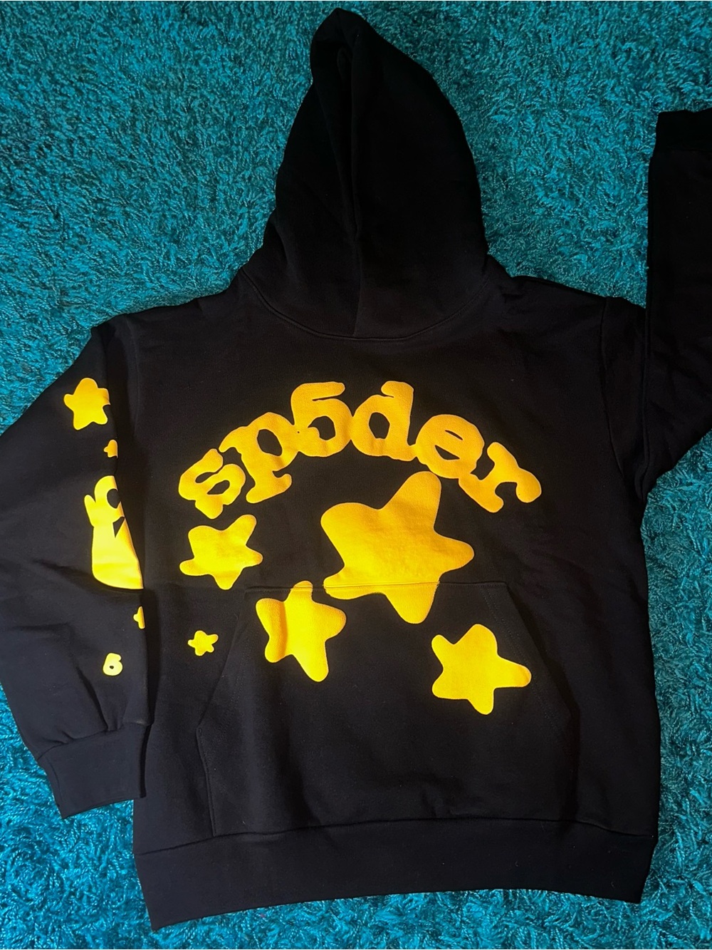 ' Black Hoodie with Yellow Star Graphic